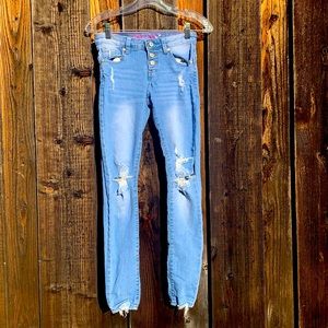 Girl’s ripped jeans